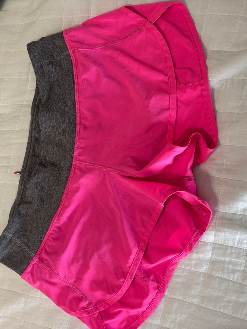Lululemon speed shorts in hot pink w/gray waistband sz 6 in excellent condition